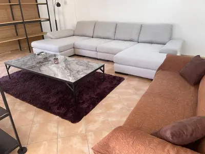 Coin salon dans l'établissement Villa climatisée piscine 3 chambres mer à 800m