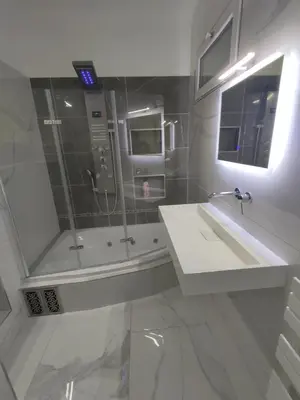 Salle de bains dans l'établissement Eaux Bulles Azur