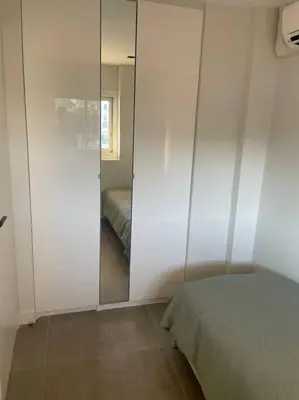 Un ou plusieurs lits dans un hébergement de l'établissement Appartement MARTINEZ 5 couchages