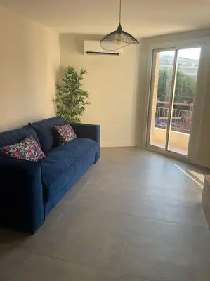 Coin salon dans l'établissement Appartement MARTINEZ 5 couchages