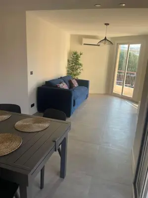 Coin salon dans l'établissement Appartement MARTINEZ 5 couchages