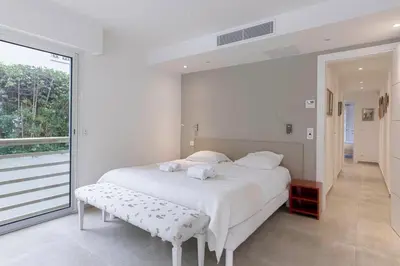 Un ou plusieurs lits dans un hébergement de l'établissement Jardin d'Azur – Terrace, Calm & Croisette
