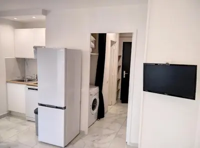 Cuisine ou kitchenette dans l'établissement Résidence Graziella Studio 604