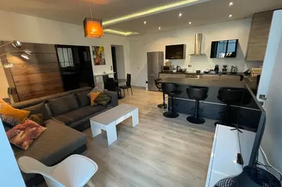 Coin salon dans l'établissement WE CANNES ! Résidence Gallia apartment premium two bedroom