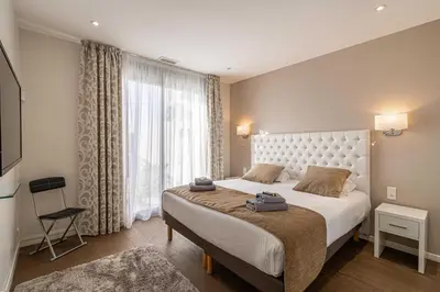 Un ou plusieurs lits dans un hébergement de l'établissement Splendid apartment, Sea view, Parking - Croisette