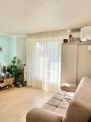 Coin salon dans l'établissement Palm Beach apartment