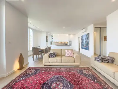 Coin salon dans l'établissement Le Duplex by Winsome Destination