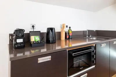 Cuisine ou kitchenette dans l'établissement Nest in Mandara