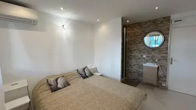 Un ou plusieurs lits dans un hébergement de l'établissement A010-Superbe appartement refait à neuf proche Croisette