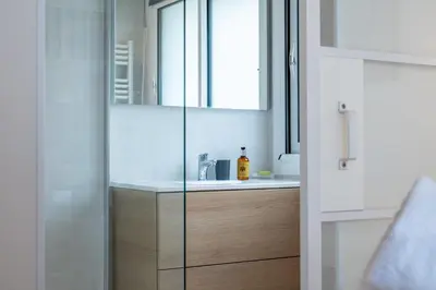 Un ou plusieurs lits dans un hébergement de l'établissement 2-room apartment with terrace close to the center