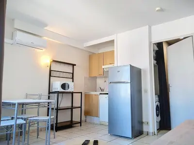 Cuisine ou kitchenette dans l'établissement Résidence Graziella Studio 624