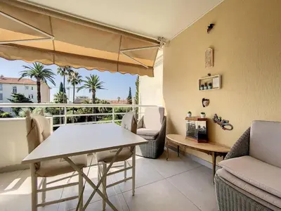 Coin salon dans l'établissement Cannes - 3 pieces a 15mn Palais