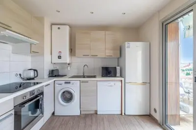 Cuisine ou kitchenette dans l'établissement Vue mer, Terrasse, 5 min du centre
