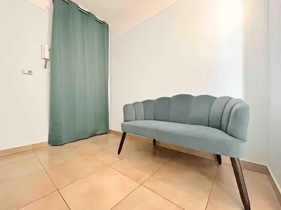 Coin salon dans l'établissement Le Dulys : Apt 2 prs, vue mer, clim, 2 min plages