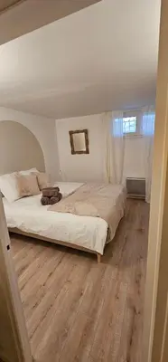 Un ou plusieurs lits dans un hébergement de l'établissement Duplex climatisé 100m2, jardin, garage individuel clos