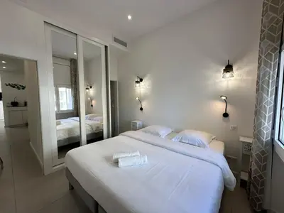 Un ou plusieurs lits dans un hébergement de l'établissement B080- À l'étroit à l'hôtel Bienvenue chez nous