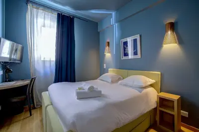 Un ou plusieurs lits dans un hébergement de l'établissement Superbe appartement T5 proche du Palais et de la Croisette