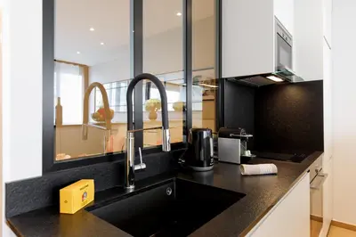 Cuisine ou kitchenette dans l'établissement My Ty Croisette Martinez YourHostHelper