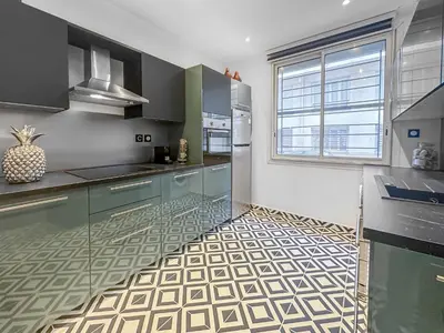 Cuisine ou kitchenette dans l'établissement La Perle de Cannes