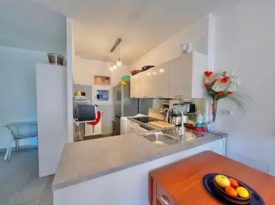 Cuisine ou kitchenette dans l'établissement Le Colony