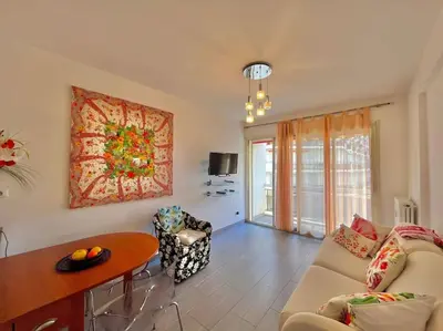 Télévision ou salle de divertissement dans l'établissement Le Colony