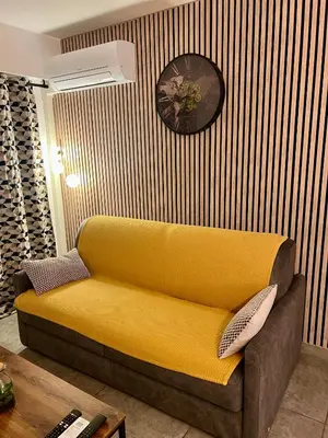 Coin salon dans l'établissement Studio Climatisé, Cosy et Calme au Centre Ville