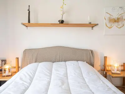 Un ou plusieurs lits dans un hébergement de l'établissement Apartment Les Aliscamps by Interhome