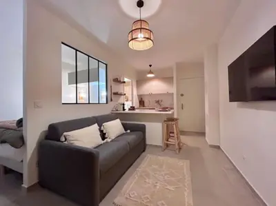 Télévision ou salle de divertissement dans l'établissement Appartement Cannes 1 chambre - QG