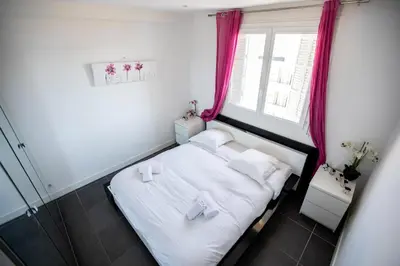 Un ou plusieurs lits dans un hébergement de l'établissement Comfort 6 People Apartment by Connexion