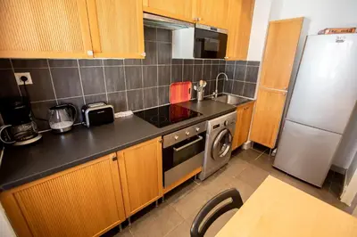 Cuisine ou kitchenette dans l'établissement Comfort 6 People Apartment by Connexion