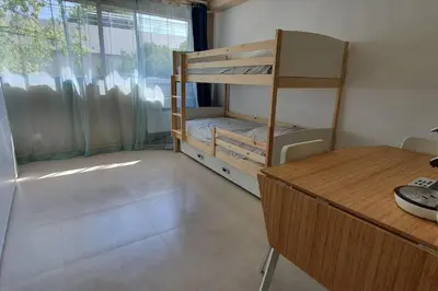 Un ou plusieurs lits dans un hébergement de l'établissement Studio Marina baie des Anges, 3 lits,clim, plages