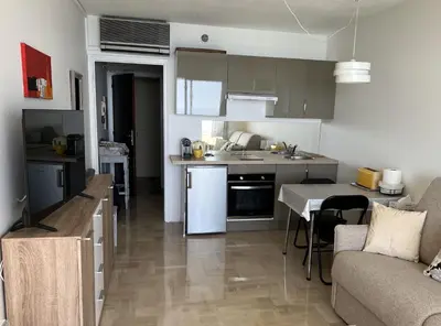 Cuisine ou kitchenette dans l'établissement Azur Bleu