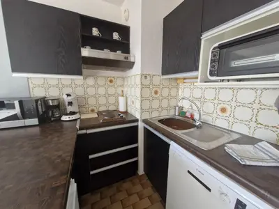 Cuisine ou kitchenette dans l'établissement Byblos studio vue mer