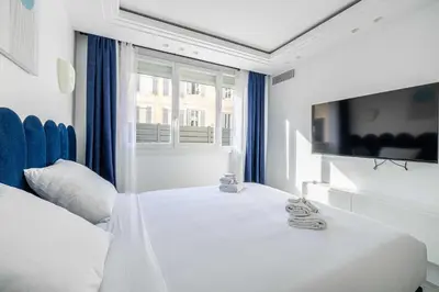 Un ou plusieurs lits dans un hébergement de l'établissement Luxurious Apartment- Croisette-Carré d'Or