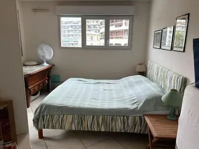 Un ou plusieurs lits dans un hébergement de l'établissement Appartement plein centre