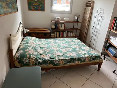 Un ou plusieurs lits dans un hébergement de l'établissement Appartement plein centre