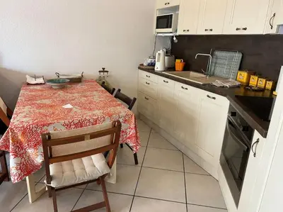 Cuisine ou kitchenette dans l'établissement Appartement plein centre