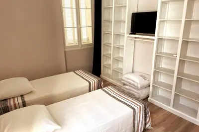 Un ou plusieurs lits dans un hébergement de l'établissement Augusta Palace - T3 **** 74m² - 150m Croisette