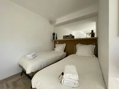 Un ou plusieurs lits dans un hébergement de l'établissement L'Olivier - Croisette Martinez, Studio sur cour, plage 1 min