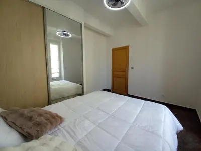 Un ou plusieurs lits dans un hébergement de l'établissement Simon Apartments