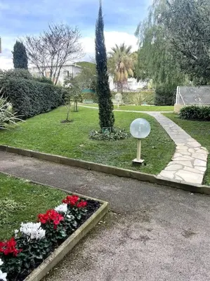 Jardin de l'établissement Grand studio vue mer - Plages à pied - Parking