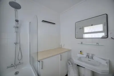 Salle de bains dans l'établissement Immogroom - cosy apartment - Terrace - AC - Wifi