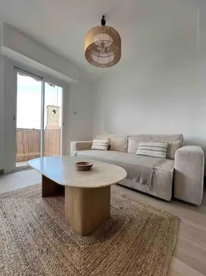 Coin salon dans l'établissement T2 tout confort proche plage