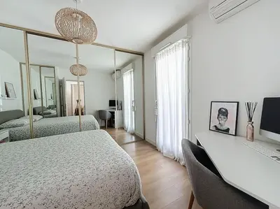 Un ou plusieurs lits dans un hébergement de l'établissement Agencia Superbe appartement 2 chambres