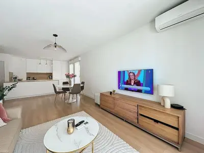 Télévision ou salle de divertissement dans l'établissement Agencia Superbe appartement 2 chambres