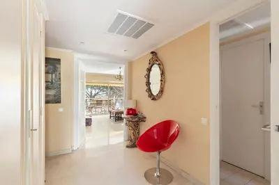 Coin salon dans l'établissement Appartement vue piscine, proche mer