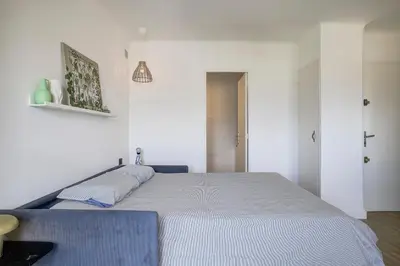 Un ou plusieurs lits dans un hébergement de l'établissement Magnifique studio Le Dauphin 50m des plages