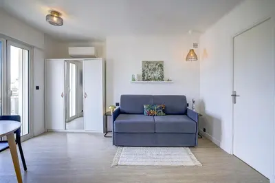 Coin salon dans l'établissement Magnifique studio Le Dauphin 50m des plages