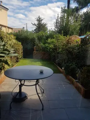 Jardin de l'établissement Studio rdj 24 m2 et piscine
