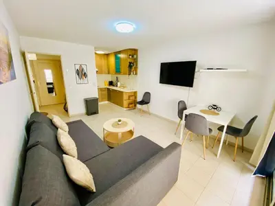 Télévision ou salle de divertissement dans l'établissement Square central